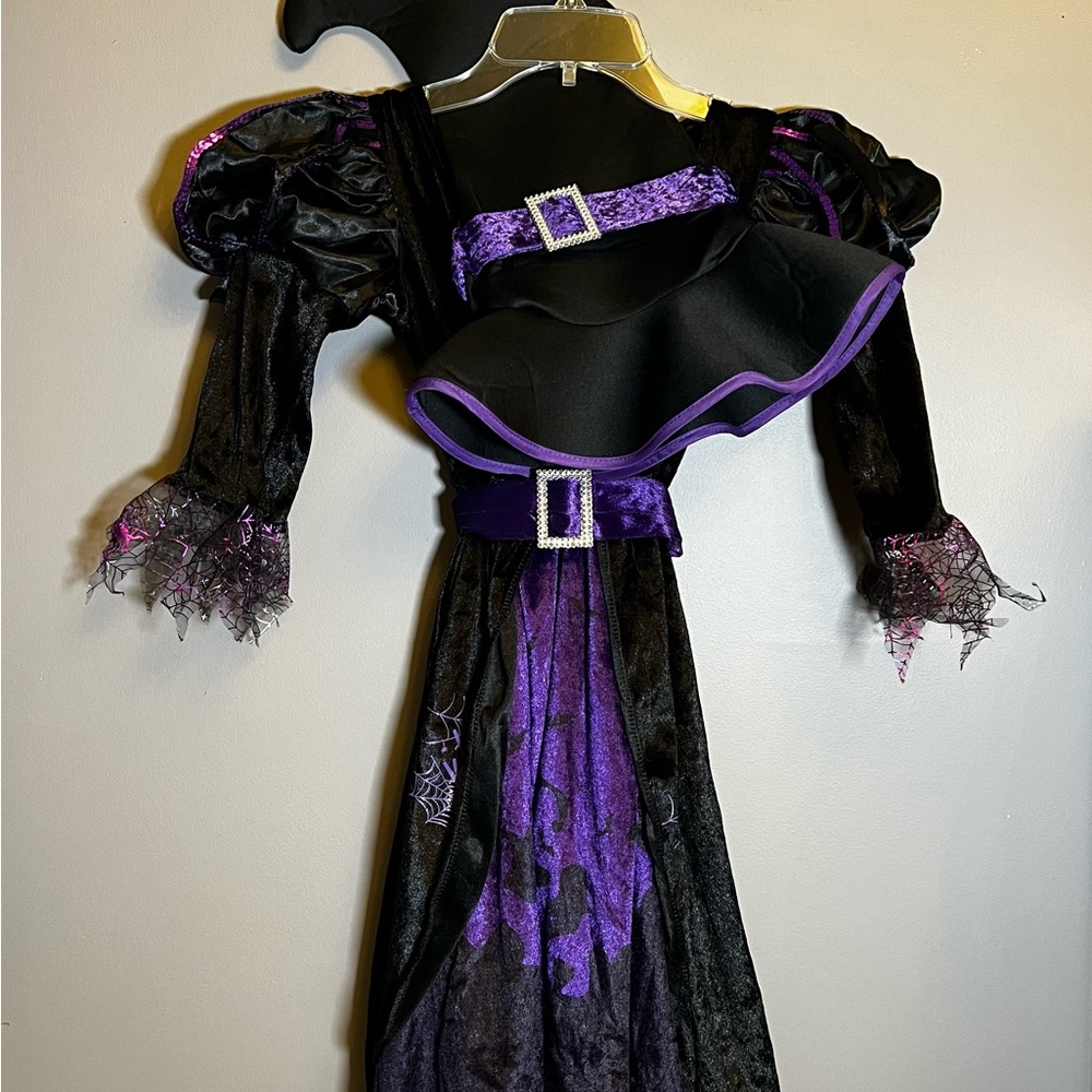 Purple witch Halloween/dress up costume size small. NEW in packaging.